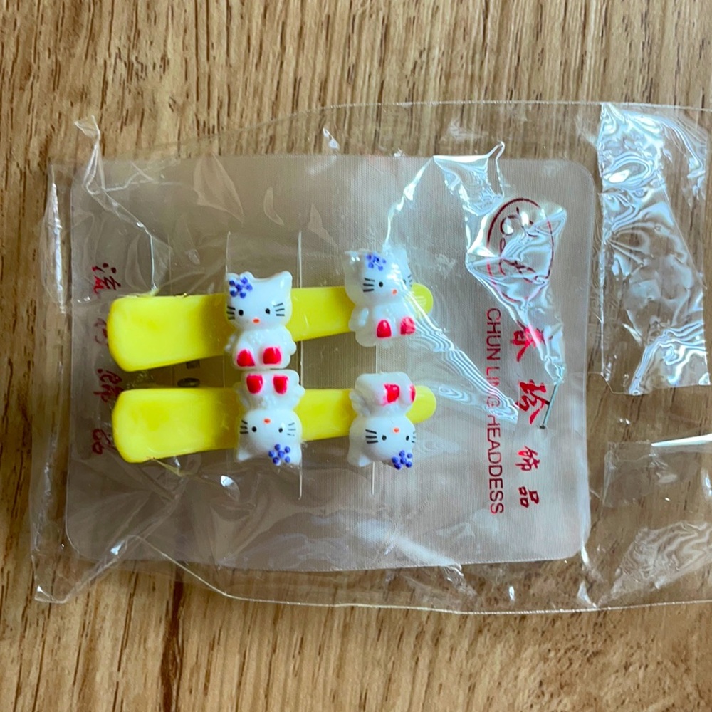 Hello Kitty little girls yellow hair clips NEW